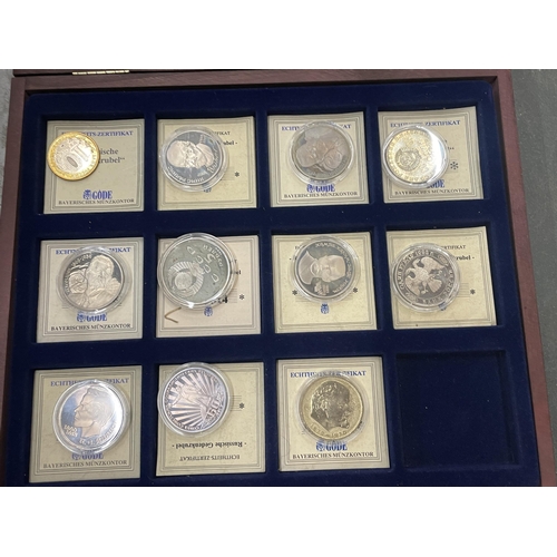 290 - A COLLECTION OF RUSSIAN COINS IN CASES, HOUSED IN A DISPLAY CASE - 11 IN TOTAL