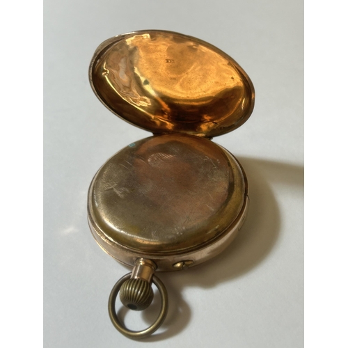 514 - A 9CT YELLOW GOLD OPEN FACED POCKET WATCH GROSS WEIGHT 89.24 GRAMS WITH LEVER ESCAPEMENT AND A ROMAN... 