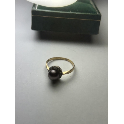 519 - AN 18CT YELLOW GOLD PEARL AND CLEAR STONE RING, SIZE N, COMPLETE WITH PRESENTATION BOX