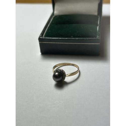 519 - AN 18CT YELLOW GOLD PEARL AND CLEAR STONE RING, SIZE N, COMPLETE WITH PRESENTATION BOX