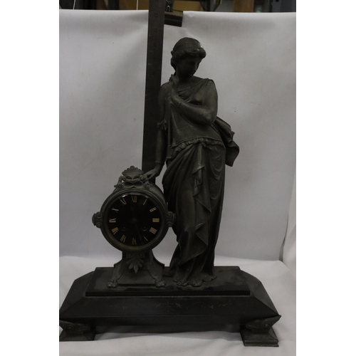 12 - A PENDULUM MANTLE CLOCK IN NAPOLEON III STYLE REPRESENTING A WOMAN HEIGHT 54CM