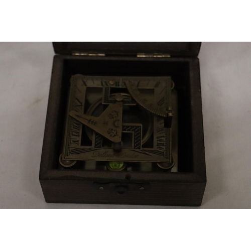 22 - A BOXED BRASS SUNDIAL COMPASS