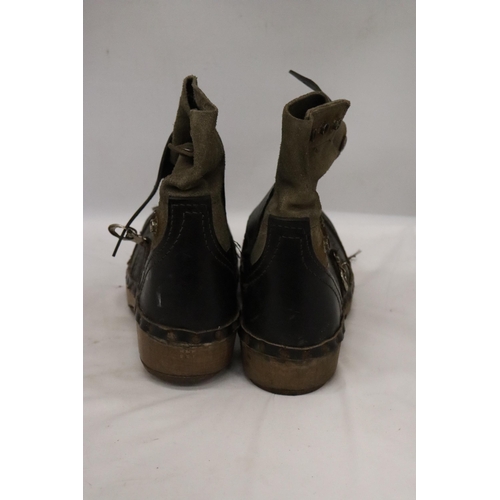 34 - A PAIR OF VINTAGE LEATHER AND WOODEN CLOGS