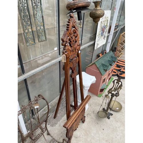 A LARGE DECORATIVE CARVED HARD WOOD EASEL