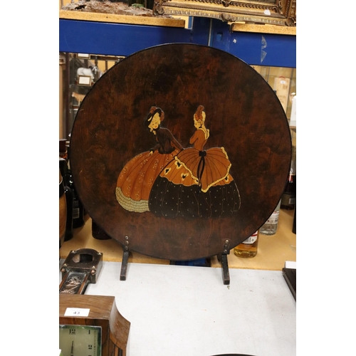 41 - AN AERT DECO CIRCUALR FIRE SCREEN WITH EMBOSSED WOODEN LADIES IN FULL DRESSES AND BONNETS