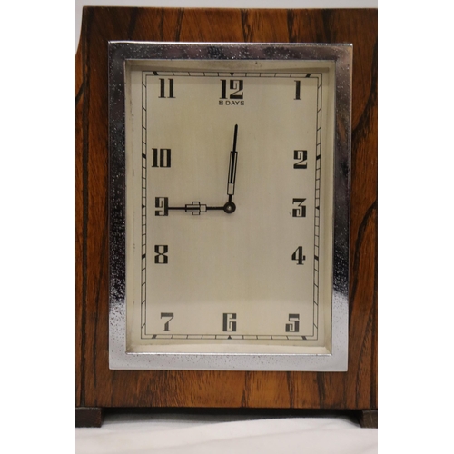 43 - A DECO STYLE OAK  8 DAY MANTLE CLOCK WITH WIND UP MECHANISM SEEN WORKING BUT NO WARRANTY