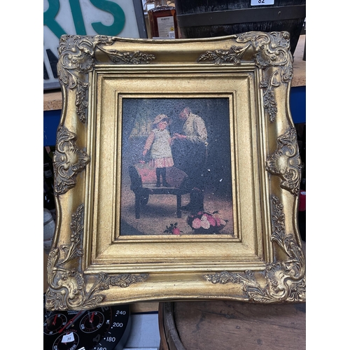 81 - A FRAMED PRINT OF A FATHER AND DAUGHTER IN A GILT FRAME