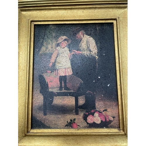 81 - A FRAMED PRINT OF A FATHER AND DAUGHTER IN A GILT FRAME