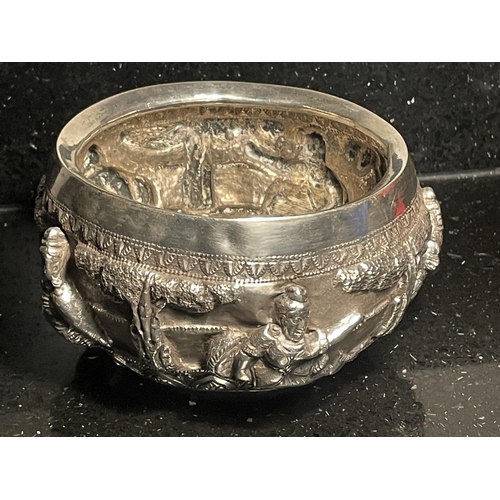 91 - AN INDIAN SILVER DISH DECORATED WITH CHERUBS GROSS WEIGHT 230 GRAMS