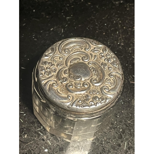 96 - A HALLMARKED SILVER TOPPED GLASS POT