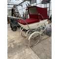 A VINTAGE SILVER CROSS PRAM