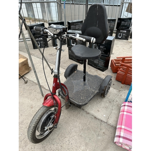 1859 - A VELECO THREE WHEELED MOBILITY SCOOTER WITH KEY AND CHARGER IN THE OFFICE