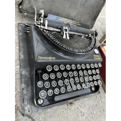 1864 - A VINTAGE REMINGTON TYPEWRITER WITH CARRY CASE AND A RETRO RADIO