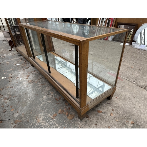 2969 - AN EARLY 20TH CENTURY FRAMED GLASS SHOP DISPLAY COUNTER 71