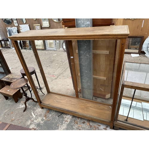 2970 - AN OAK OPEN DISPLAY CABINET