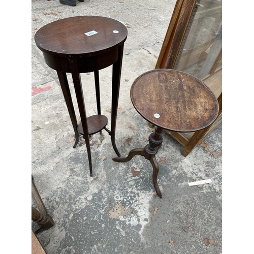 2971 - AN OVAL MAHOGANY JARDINERE STAND AND A MAHOGANY TRIPOD WINE TABLE