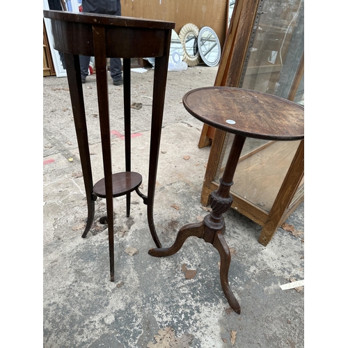 2971 - AN OVAL MAHOGANY JARDINERE STAND AND A MAHOGANY TRIPOD WINE TABLE