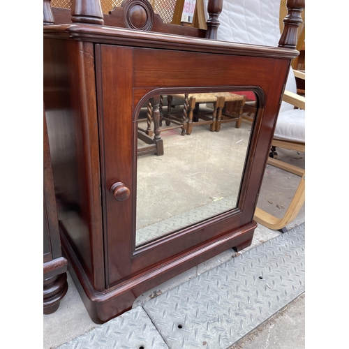 2584 - A VICTORIAN MAHOGANY TWO TIER WHAT NOT WITH MIRROR DOOR CUPBOARD TO BASE AND TURNED UPRIGHTS 24