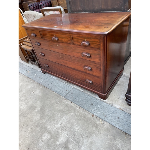 2586 - A 19TH CENTURY MAHOGANY CHEST OF THREE SHORT AND THREE LONG GRADUATED DRAWERS WITH CARVED SCOOP HAND... 