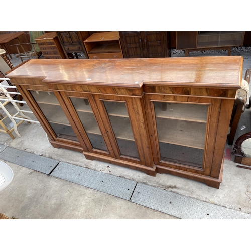 2591 - A VICTORIAN WALNUT BREAKFRONT FOUR DOOR BOOKCASE ON BRACKET FEET, 78