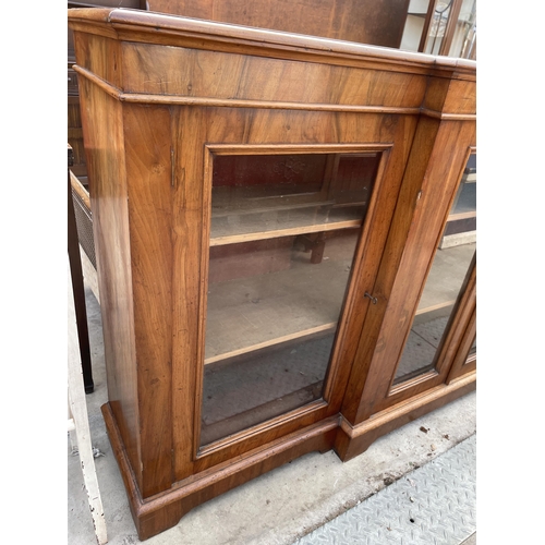 2591 - A VICTORIAN WALNUT BREAKFRONT FOUR DOOR BOOKCASE ON BRACKET FEET, 78