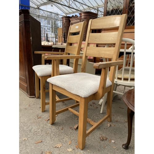 2649 - A PAIR OF OAK ELBOW CHAIRS