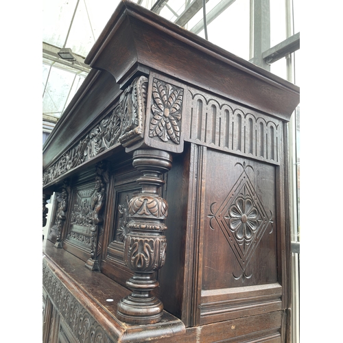 2655 - AN OAK GEORGE III STYLE COURT CUPBOARD WITH CARVED PANELS, THREE DEPICTING THE BIRTH AND CRUCIFIXION... 