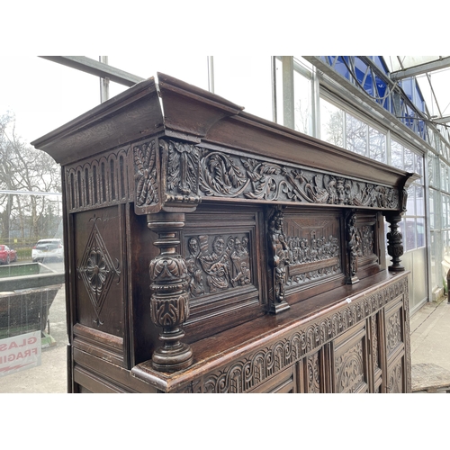 2655 - AN OAK GEORGE III STYLE COURT CUPBOARD WITH CARVED PANELS, THREE DEPICTING THE BIRTH AND CRUCIFIXION... 