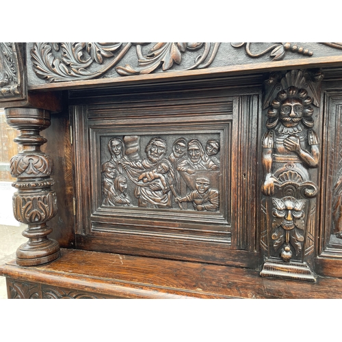 2655 - AN OAK GEORGE III STYLE COURT CUPBOARD WITH CARVED PANELS, THREE DEPICTING THE BIRTH AND CRUCIFIXION... 