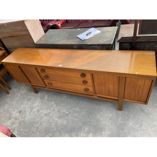 2657 - A RETRO TEAK SIDEBOARD ENCLOSING THREE DRAWERS AND FOUR CUPBOARDS BEARING TIMES FURNISHINGS LABEL