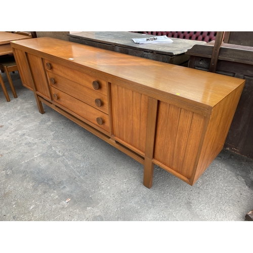 2657 - A RETRO TEAK SIDEBOARD ENCLOSING THREE DRAWERS AND FOUR CUPBOARDS BEARING TIMES FURNISHINGS LABEL