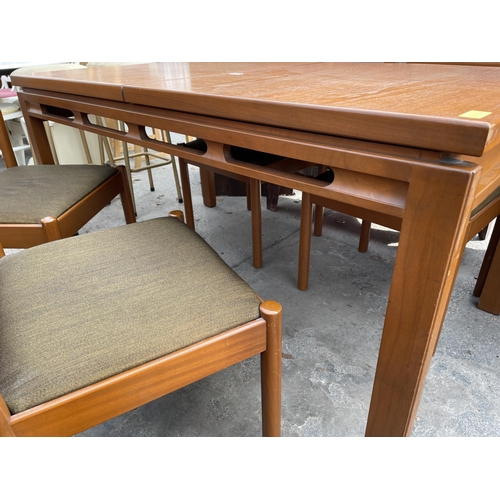 2658 - A RETRO TEAK EXTENDING DINING TABLE 60