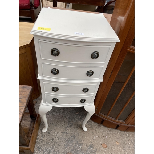 2662 - A WHITE PAINTED CHEST OF FOUR DRAWERS ON CABRIOLE LEGS 14.5