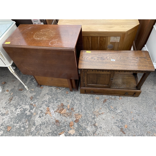 2663 - A MID 20TH CENTURY SMALL OAK TWO TIER TABLE WITH PULL THROUGH DRAWER AND CUPBOARD 28