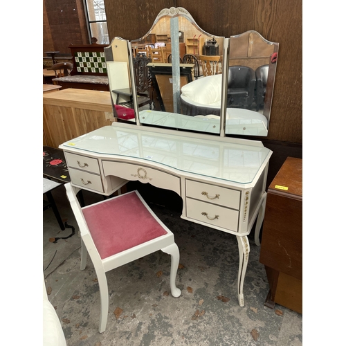 2664 - A CREAM AND GILT DRESSING TABLE WITH SIMILAR DRESSING STOOL