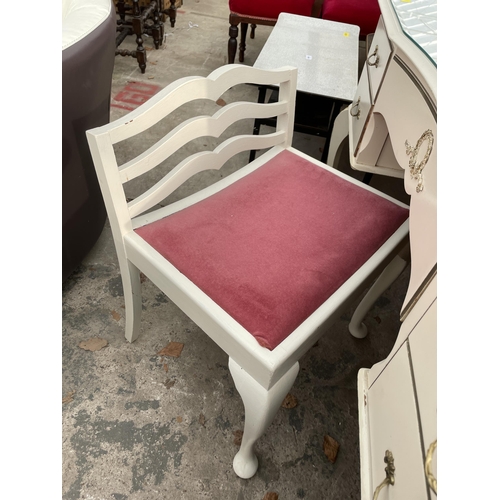 2664 - A CREAM AND GILT DRESSING TABLE WITH SIMILAR DRESSING STOOL