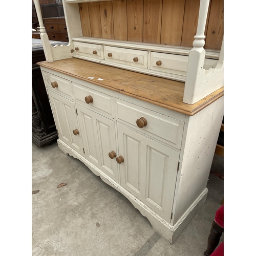 2667 - A PAINTED PINE KITCHEN DRESSER WITH PLATE RACK ENCLOSING THREE DRAWERS 54