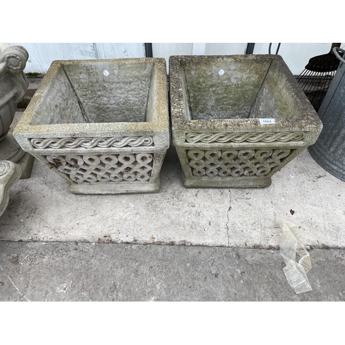 1662 - A PAIR OF DECORATIVE SQUARE CONCRETE GARDEN PLANTERS