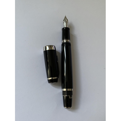 502A - A MONT BLANC BOHEMME RETRACTABLE FOUNTAIN PEN WITH BLUE STONE AND A 14 CARAT GOLD NIB