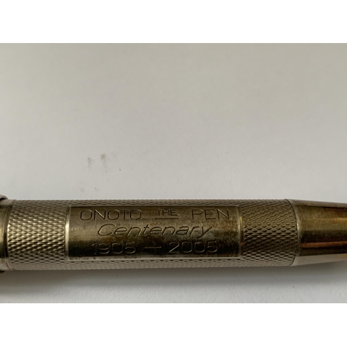 504 - AN ONOTO HALLMARKED LONDON SILVER CENTENARY 1905-2005 FOUNTAIN PEN WITH A SIZE 7 18 CARAT GOLD NIB