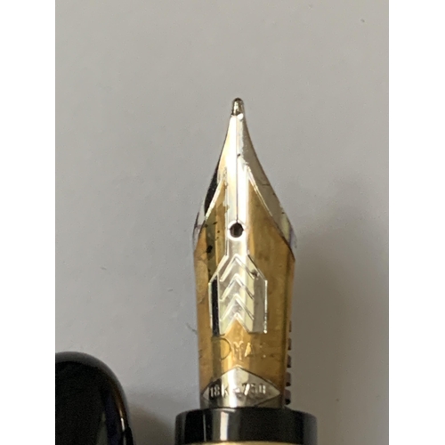 506B - AN OMAS FOUNTAIN PEN MARKED THE MUSEUM OF MODERN ART NEW YORK WITH AN 18 CARAT GOLD NIB