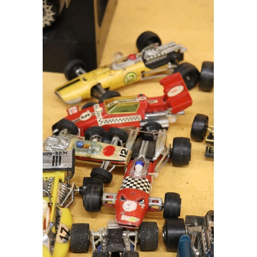 384 - EIGHT LARGER SCALE VINTAGE 1970S F1 RACING CARS