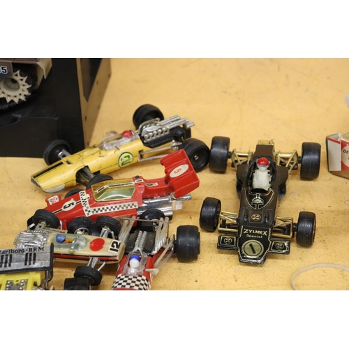 384 - EIGHT LARGER SCALE VINTAGE 1970S F1 RACING CARS