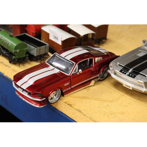 387 - A LARGE MODEL OF A 1968 FORD SHELBY PLUS A MAISTO 1967 FORD MUSTANG