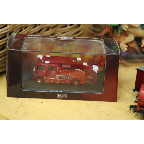 390 - A BOXED DINKY TOYS, NO. 197 MORRIS MINI-TRAVELLER PLUS A BOXED ATLAS FIRE ENGINE