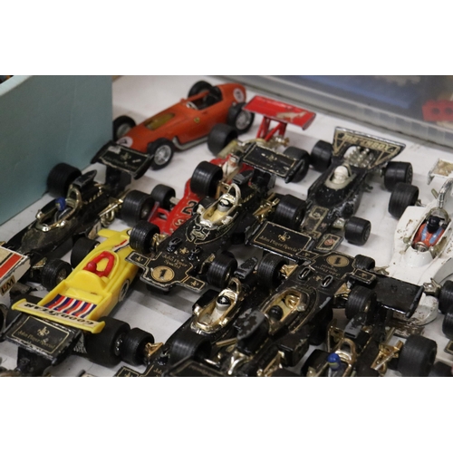 395 - A LARGE QUANTITY OF VINTAGE DIE-CAST CORGI AND MATCHBOX F1 RACING CARS