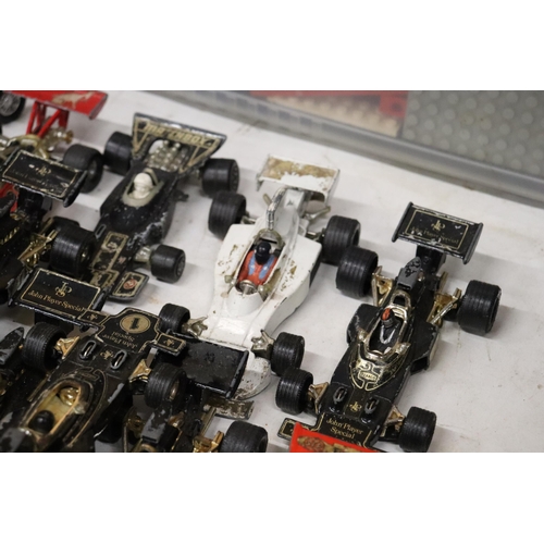 395 - A LARGE QUANTITY OF VINTAGE DIE-CAST CORGI AND MATCHBOX F1 RACING CARS