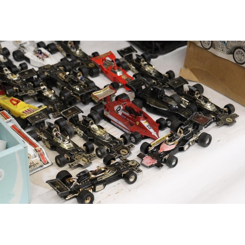 395 - A LARGE QUANTITY OF VINTAGE DIE-CAST CORGI AND MATCHBOX F1 RACING CARS