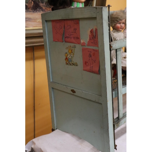 398 - A VINTAGE DOLL'S COT WITH THREE DOLLS, ONE A PALITOY AND A TEDDY BEAR