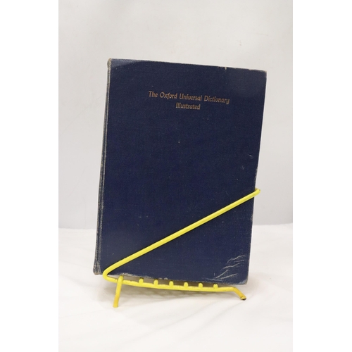 804 - A PAIR OF OXFORD UNIVERSAL DICTIONARY'S IN METAL STAND